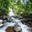 Visiting a waterfall in Khao Lak, Thailand