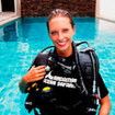 An Open Water Diver student ready for her pool lesson in Chalong