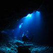 Divers explore the many caverns of Koh Ha, Thailand